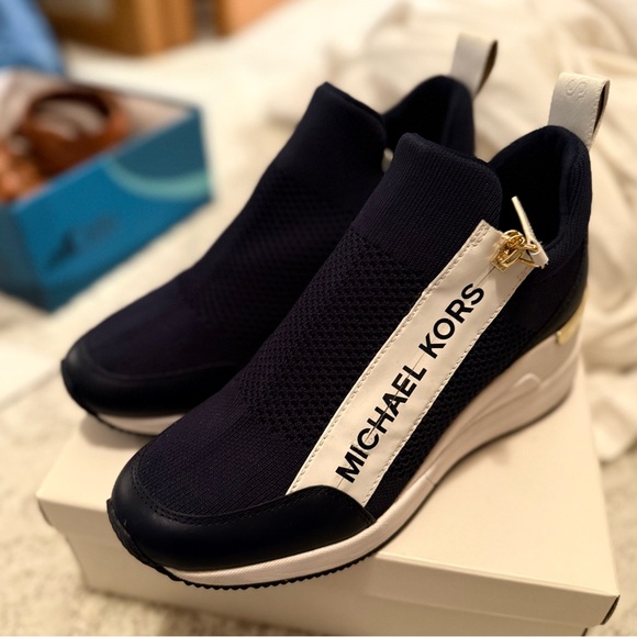 Michael Kors Black and White High-Top Sneakers - Picture 1 of 6